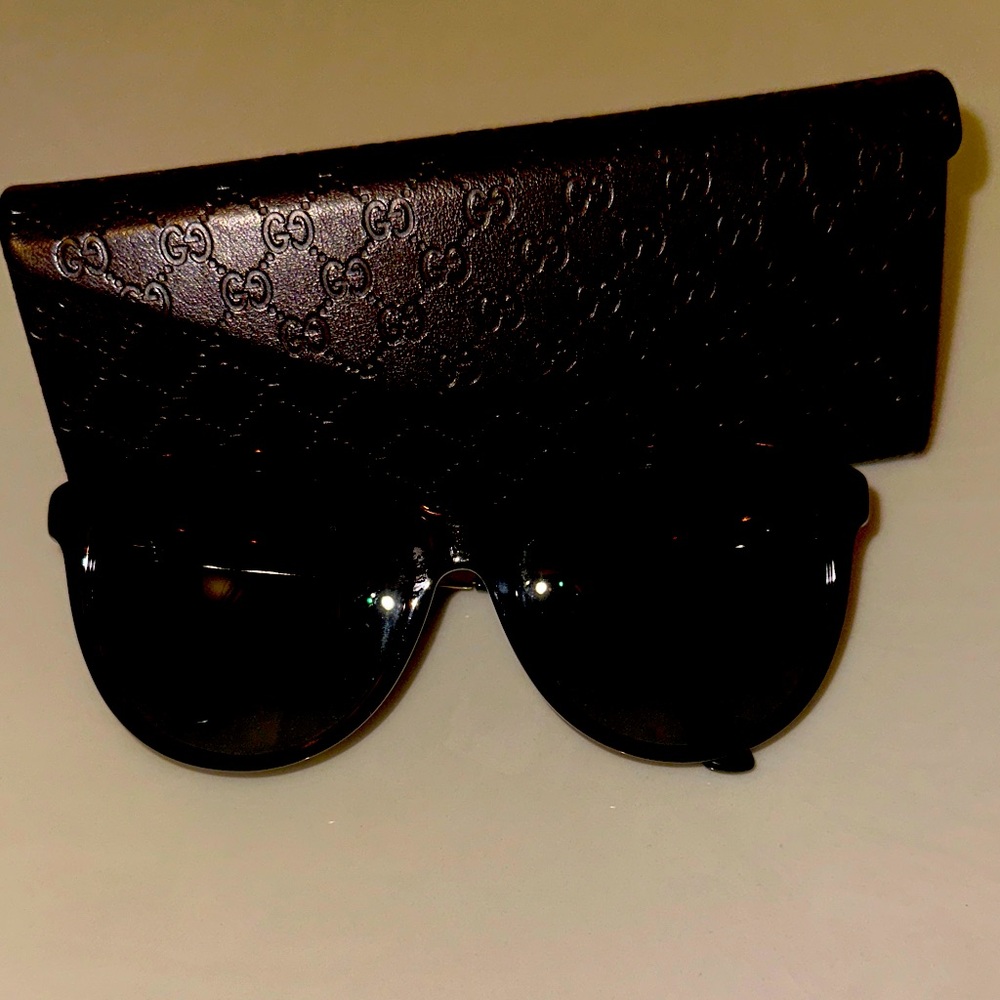Gucci Dark Sunglasses with Embossed Case